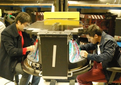 Mario and Daniel plugging fiber optics into a spectrograph plug plate